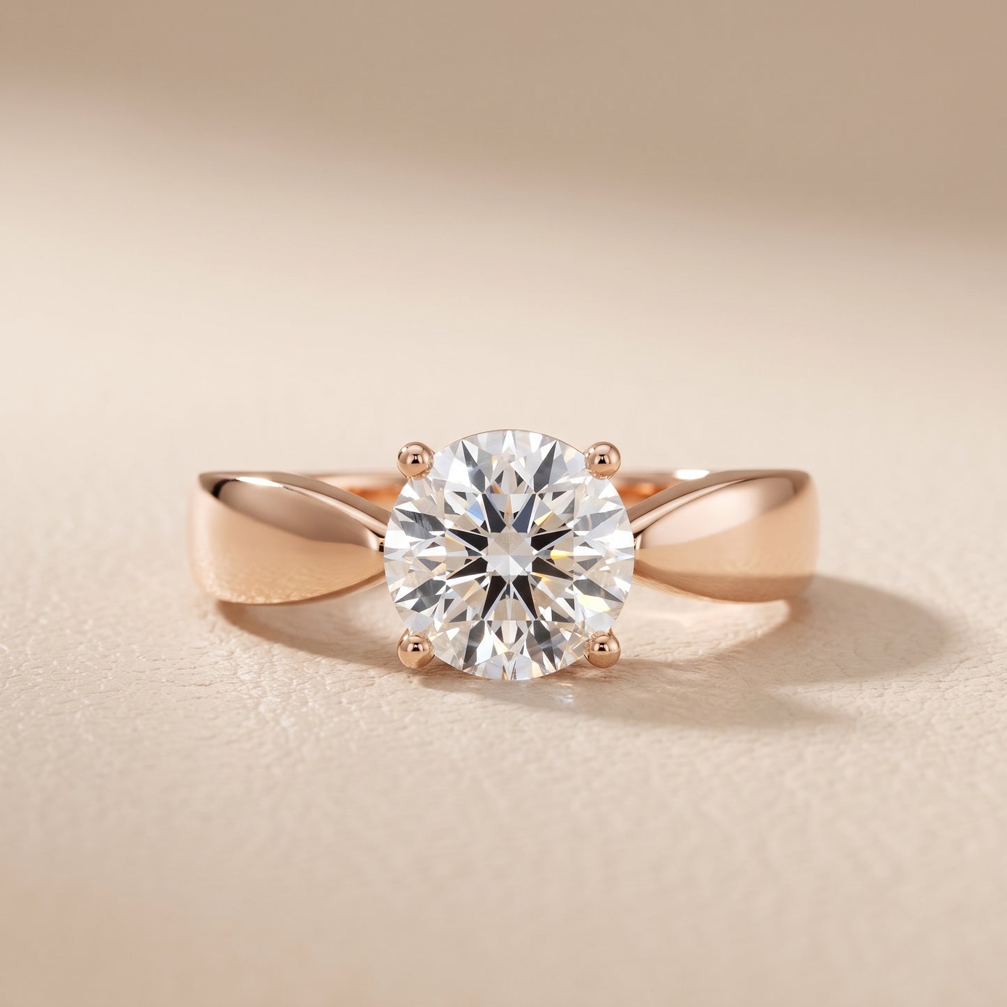 Talia Solitaire Twist Round Diamond Engagement Ring in Rose Gold - front.jpg
