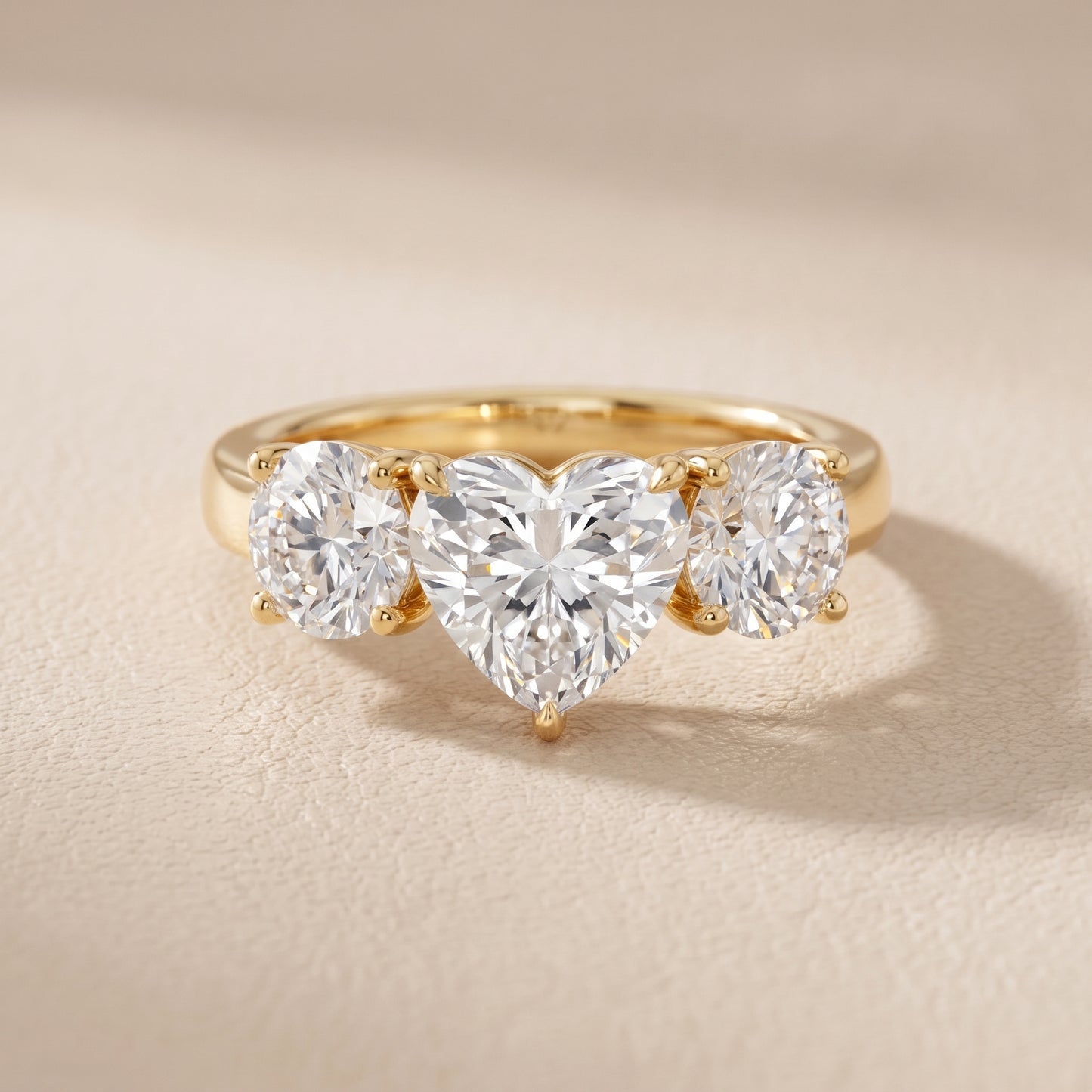 Esme Three-Stone Tapered Heart Diamond Ring in Yellow Gold - front.jpg