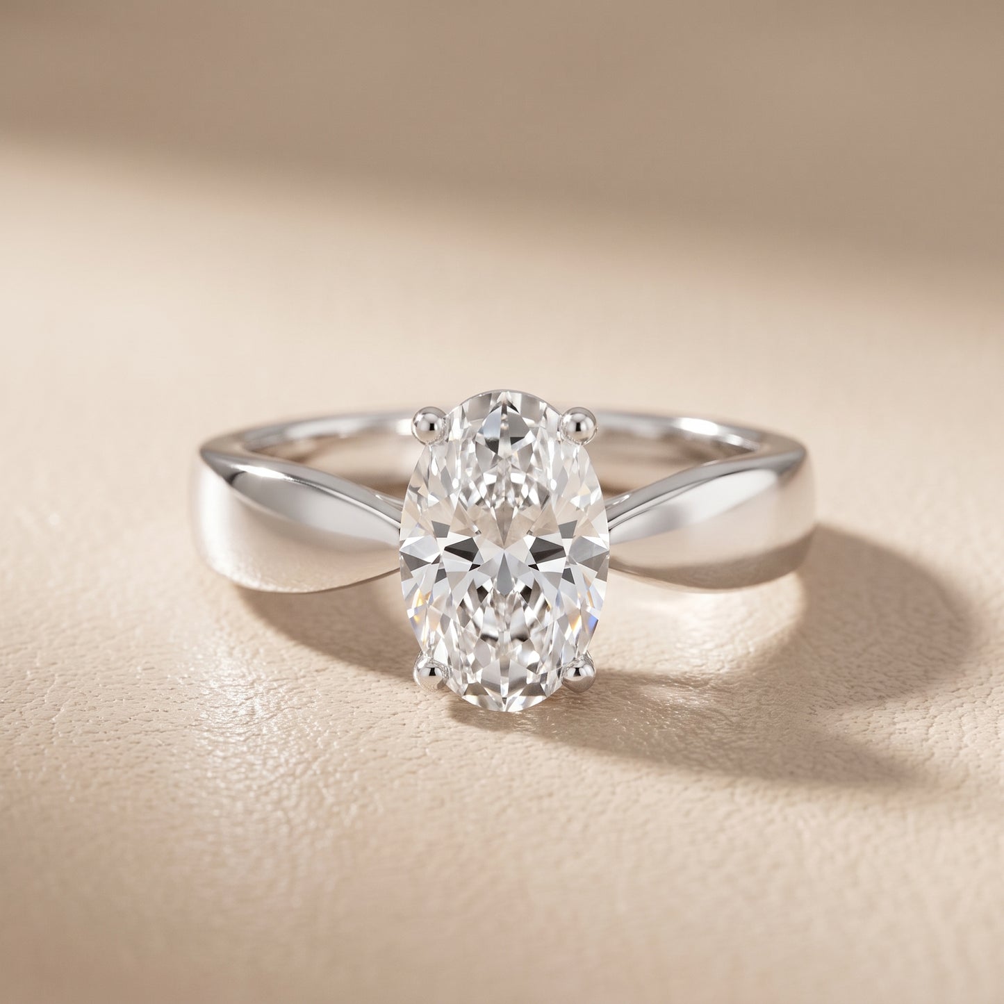 Talia Solitaire Twist Oval Diamond Engagement Ring in Platinum - front.jpg