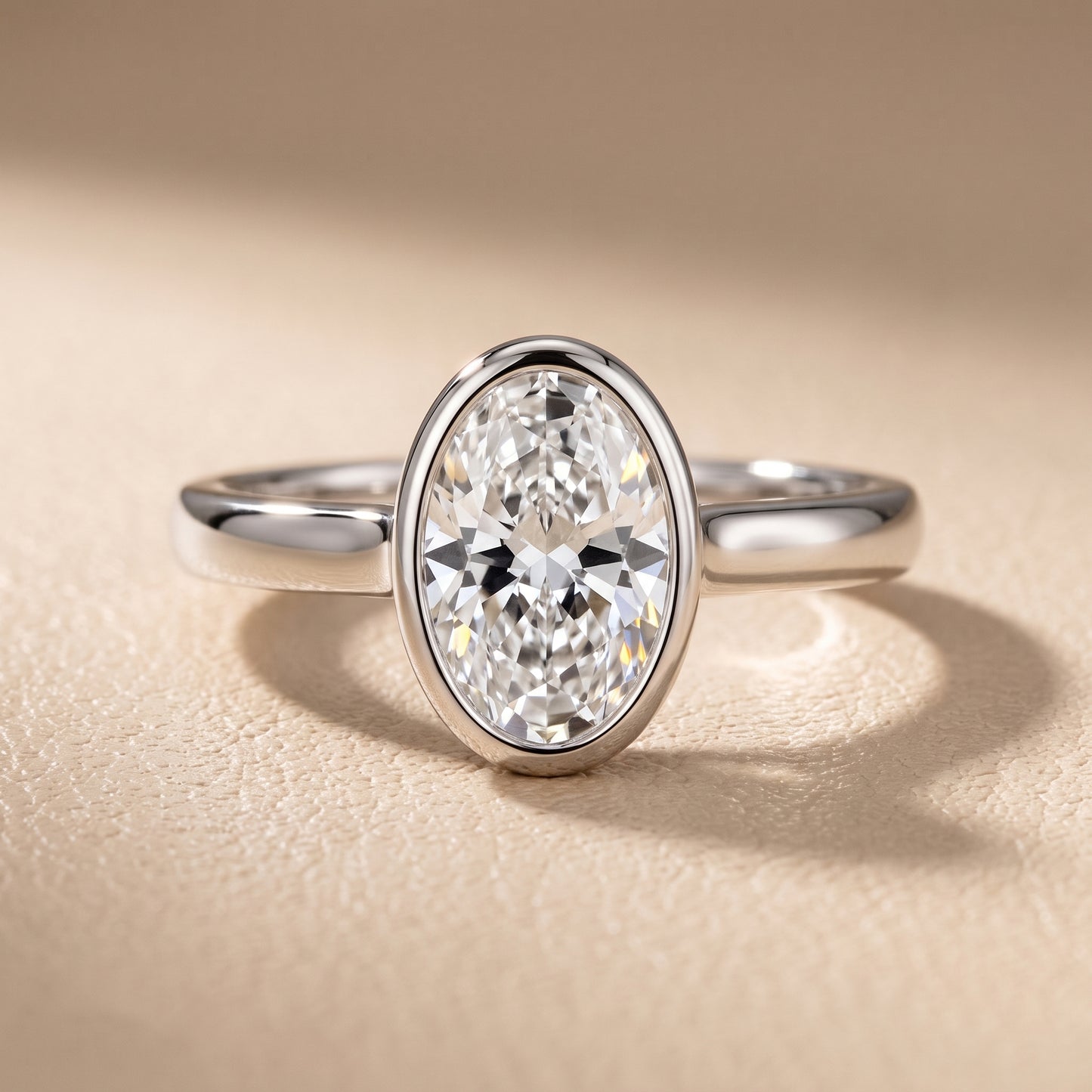 Jolie Bezel Solitaire Oval Diamond Engagement Ring in White Gold - front.jpg