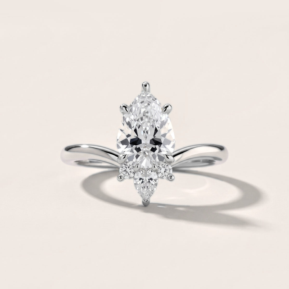 Isadora Bypass Cluster Pear Diamond Engagement Ring in Platinum - front.jpg