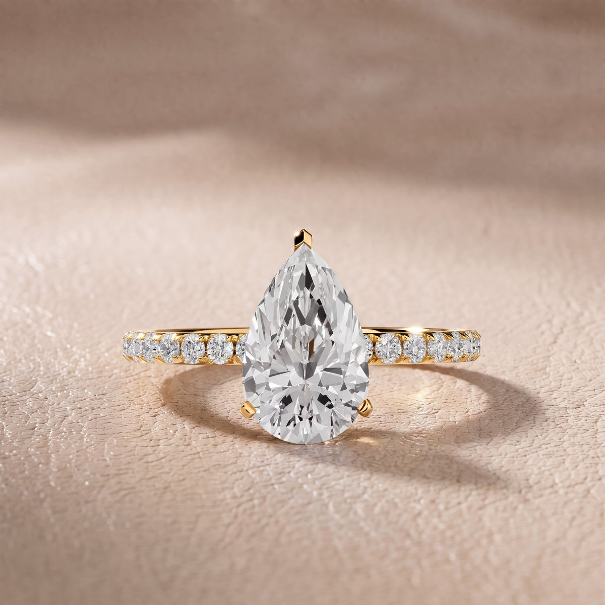 Juna French Pavé Solitaire Pear Diamond Engagement Ring in Yellow Gold - front.jpg