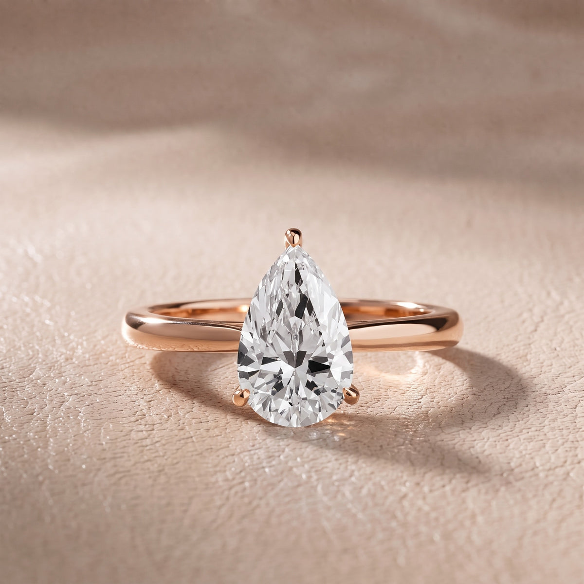 Kalia Knife Edge Solitaire Pear Diamond Engagement Ring in Rose Gold - front.jpg