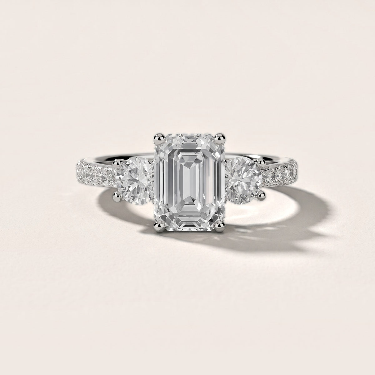 Sibyl Trellis Three-Stone Emerald Diamond Engagement Ring in White Gold - front.jpg