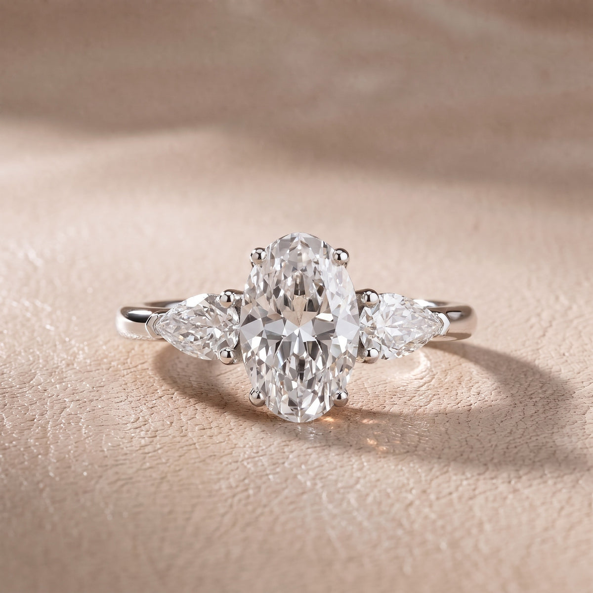 Sophia Three-Stone Oval Diamond Engagement Ring in Platinum - front.jpg