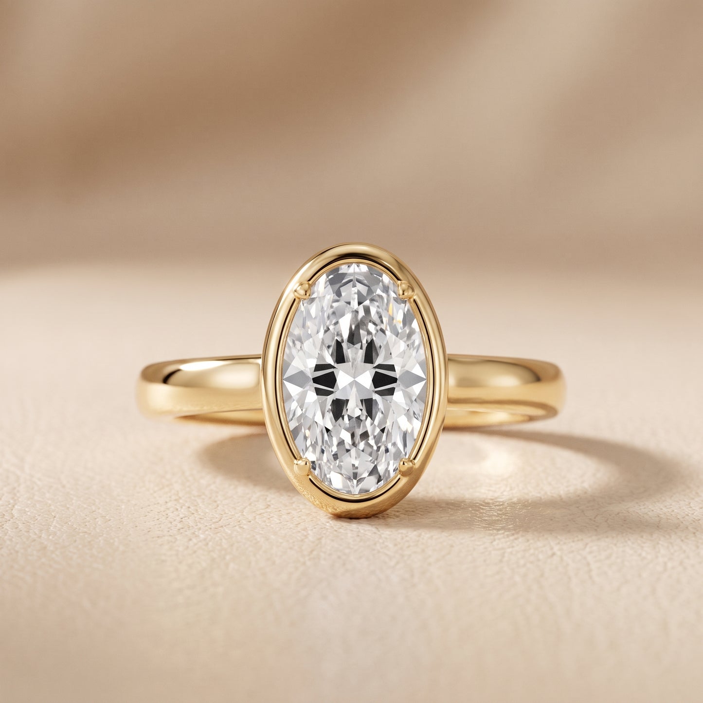 Alina Bezel Solitaire Oval Diamond Ring in Yellow Gold - front.jpg