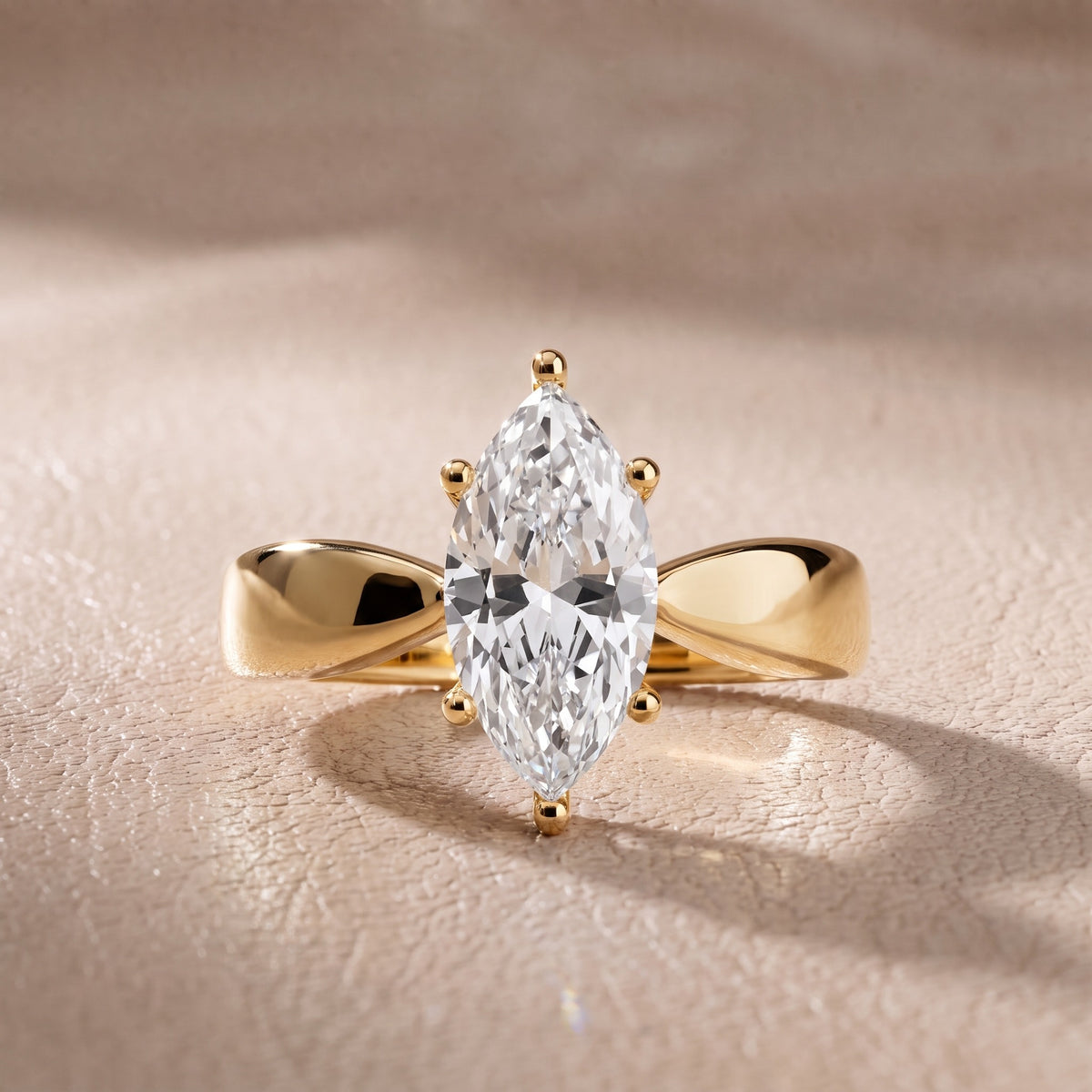 Talia Solitaire Twist Marquise Diamond Engagement Ring in Yellow Gold - front.jpg