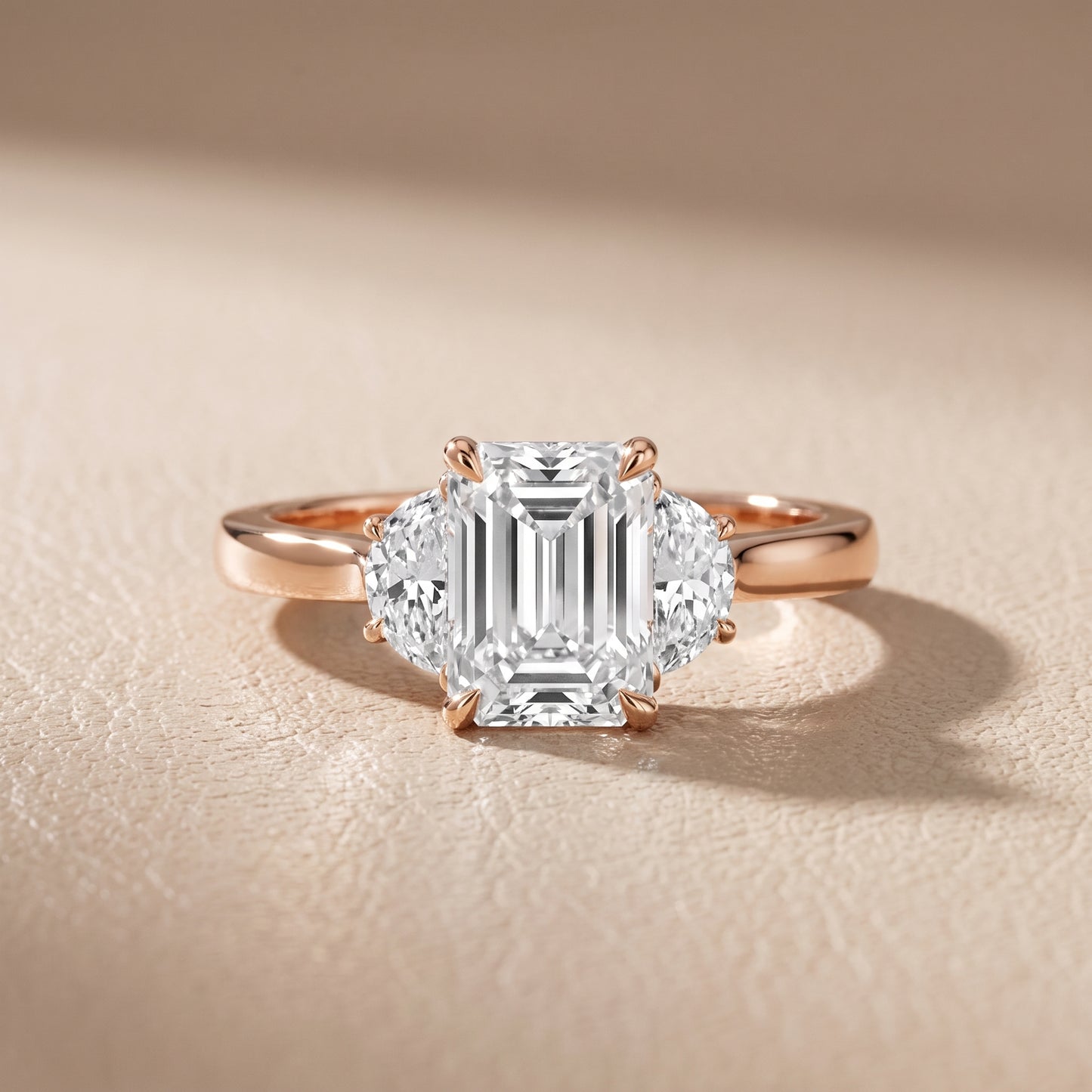 Romy Three-Stone Emerald Diamond Engagement Ring in Rose Gold - front.jpg