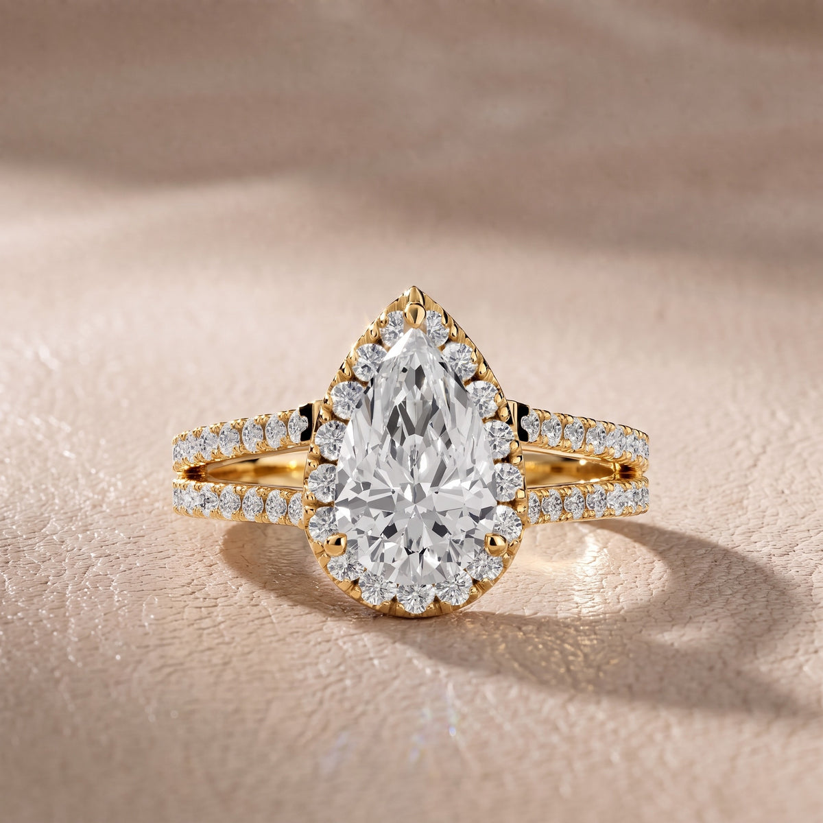 Kira Halo Split Shank Pear Diamond Engagement Ring in Yellow Gold - front.jpg