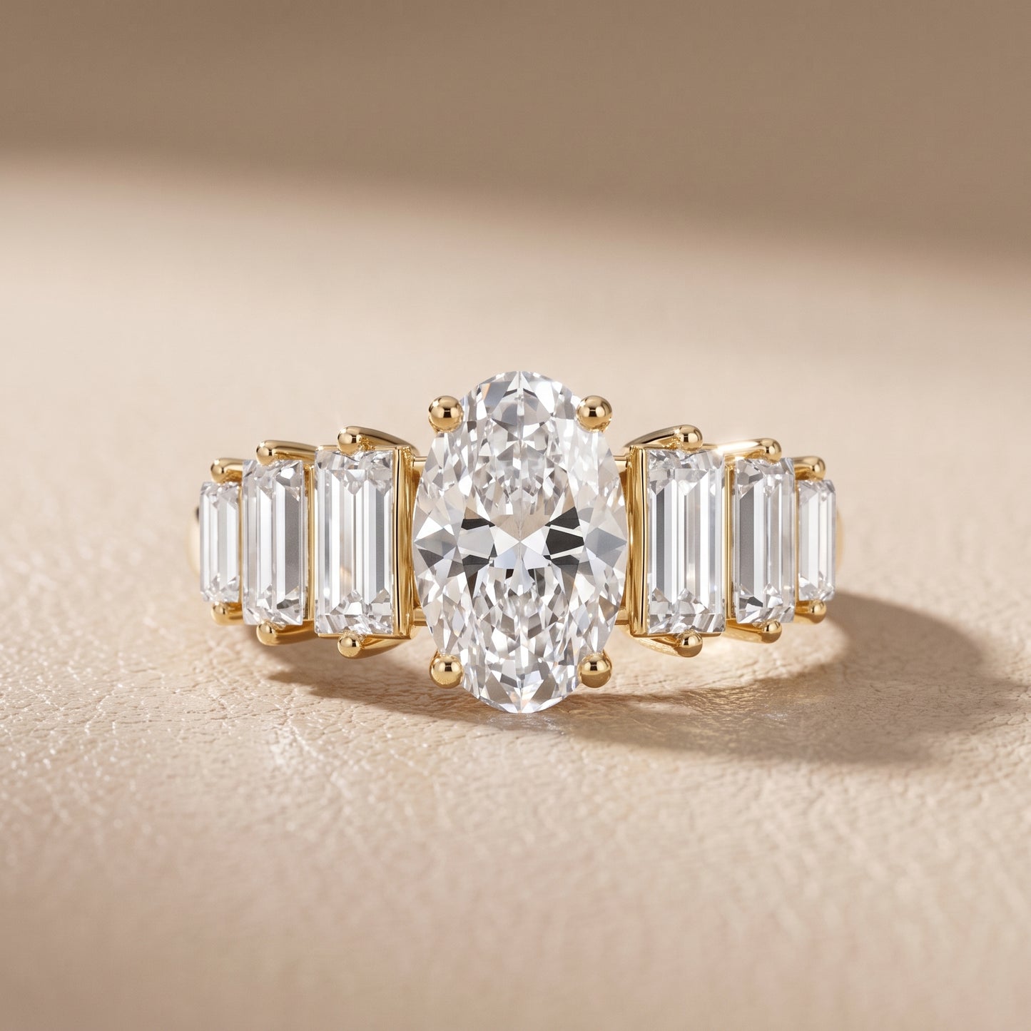 Mara Sidestone Baguette Accent Oval Diamond Engagement Ring in Yellow Gold - front.jpg