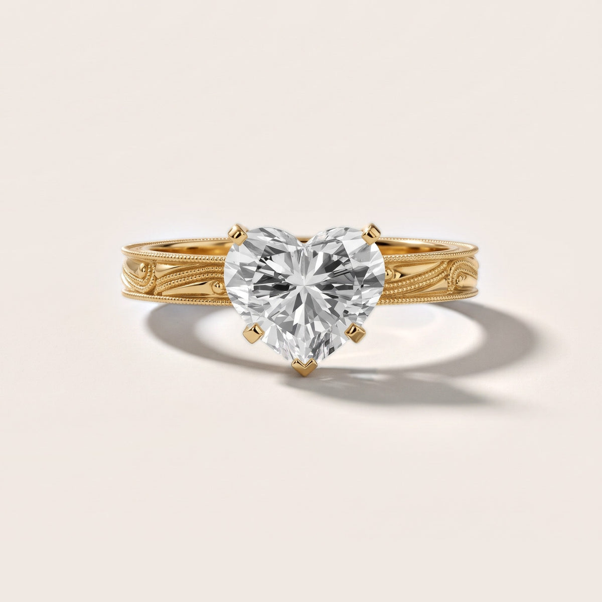 Abbie Engraved Solitaire Heart Diamond Engagement Ring in Yellow Gold - front.jpg