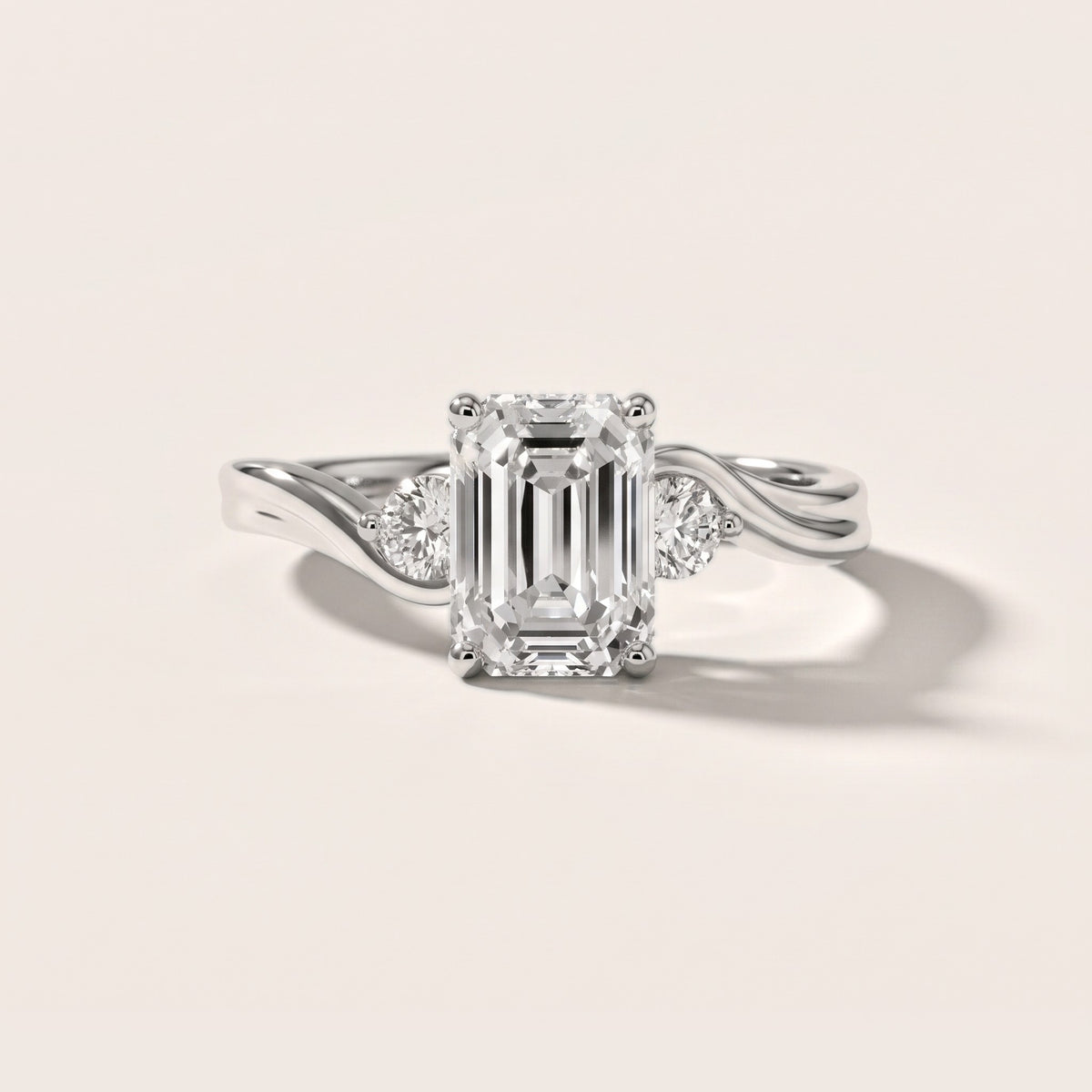 Rena Bypass Three-Stone Emerald Diamond Engagement Ring in Silver - front.jpg