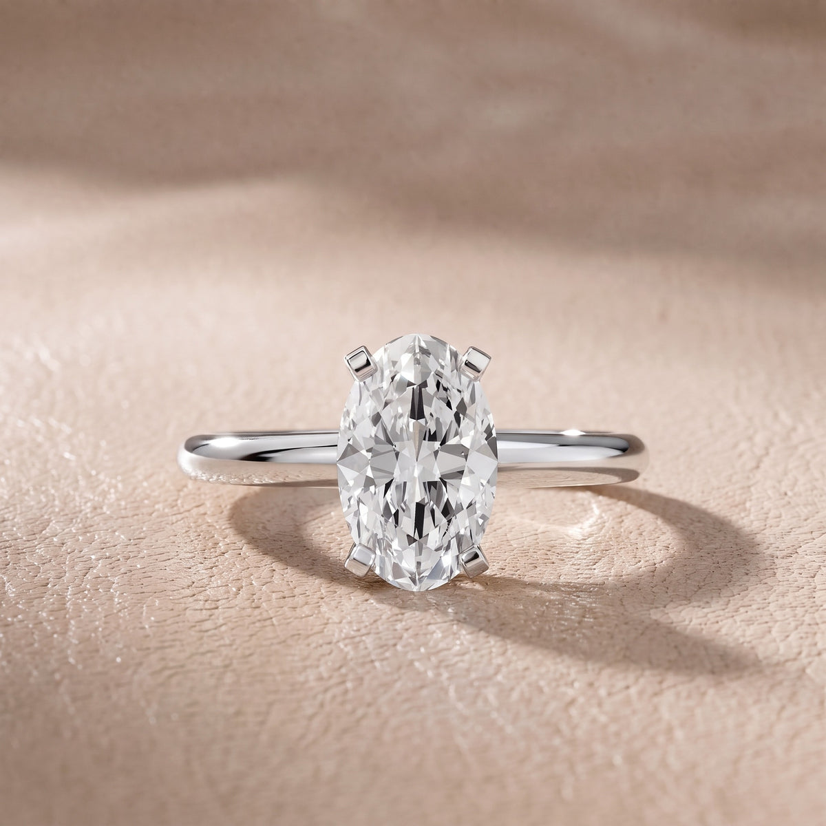 Arabella Six-Prong Solitaire Oval Diamond Engagement Ring in Platinum - front.jpg