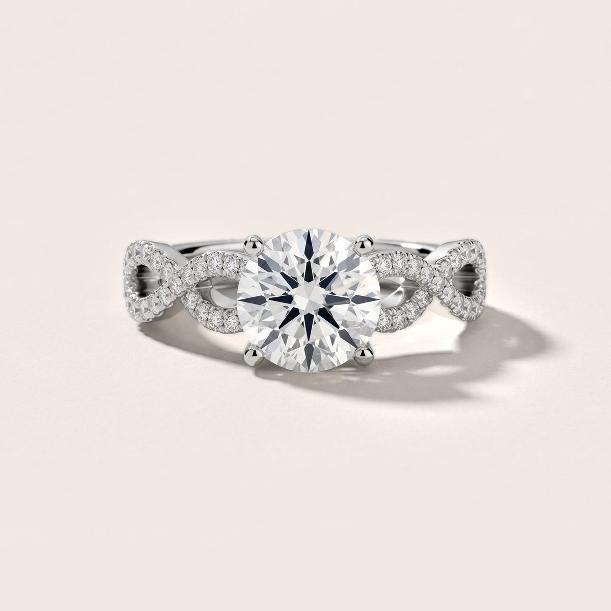 Althea Twist Micropavé Round Diamond Engagement Ring in Platinum - front.jpg