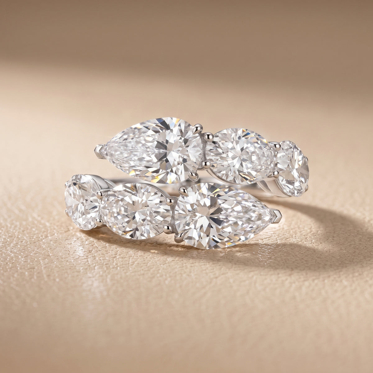 Ines Bypass Pear & Oval Diamond Anniversary Ring in White Gold - front.jpg