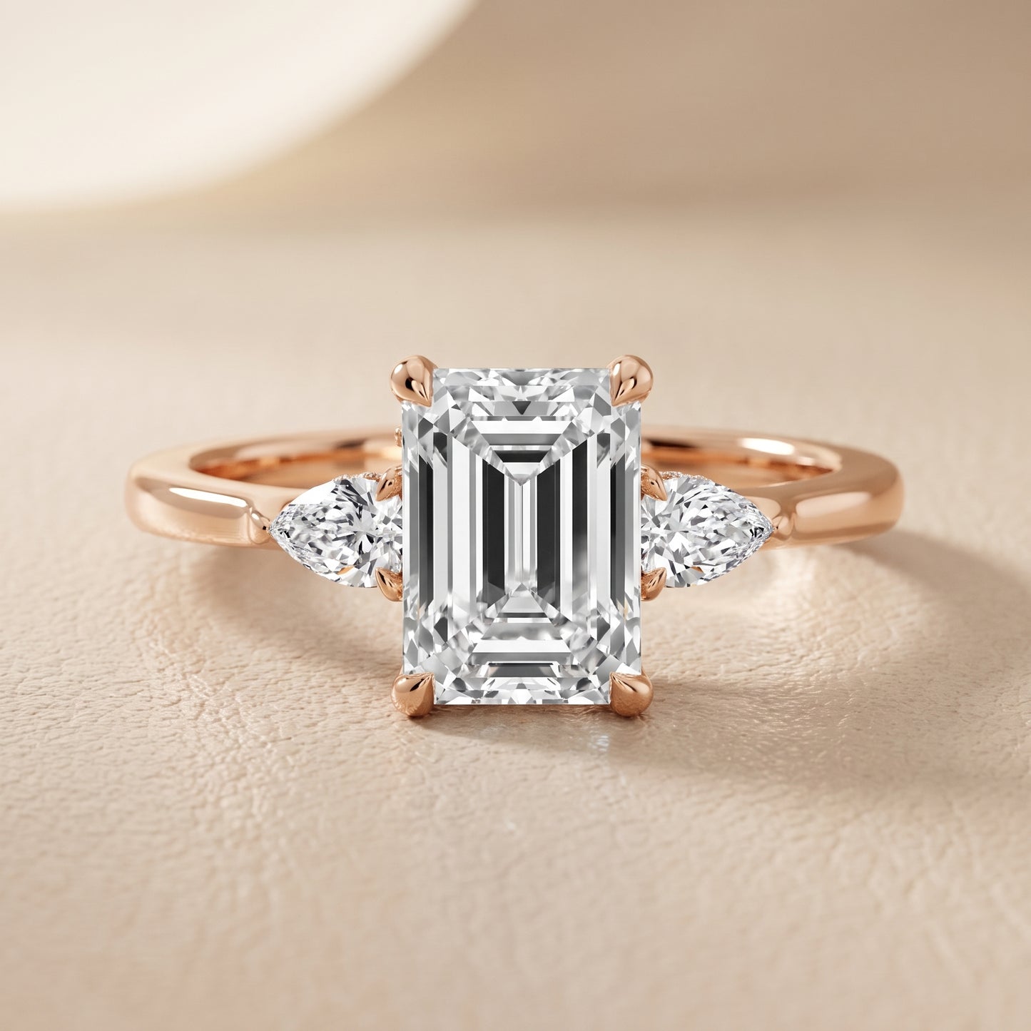 Leila Three-Stone Emerald Diamond Engagement Ring in Rose Gold - front.jpg
