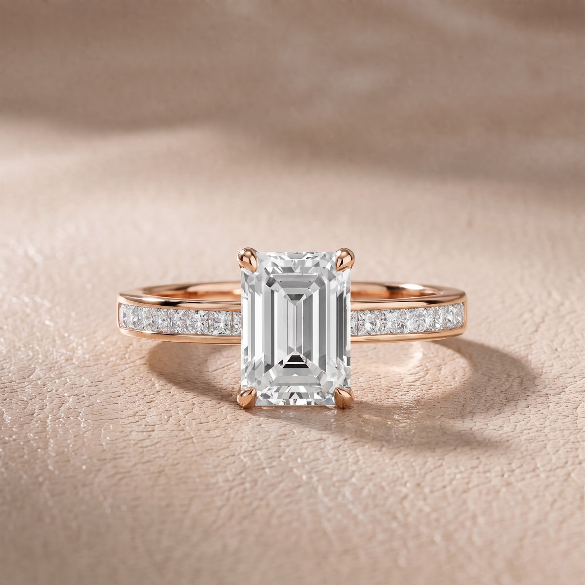 Maren Sidestone Channel Set Emerald Diamond Engagement Ring in Rose Gold - front.jpg