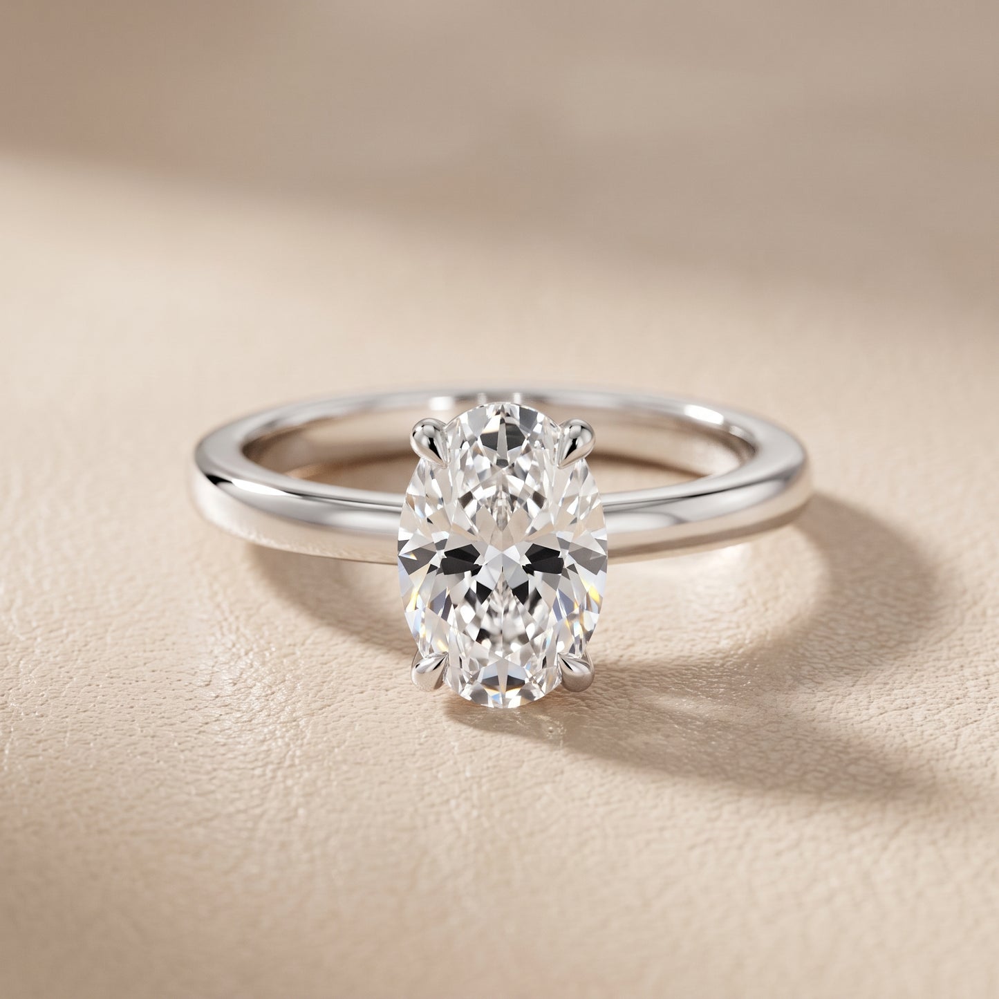 Lyla Petite Solitaire Oval Diamond Engagement Ring in Platinum - front.jpg