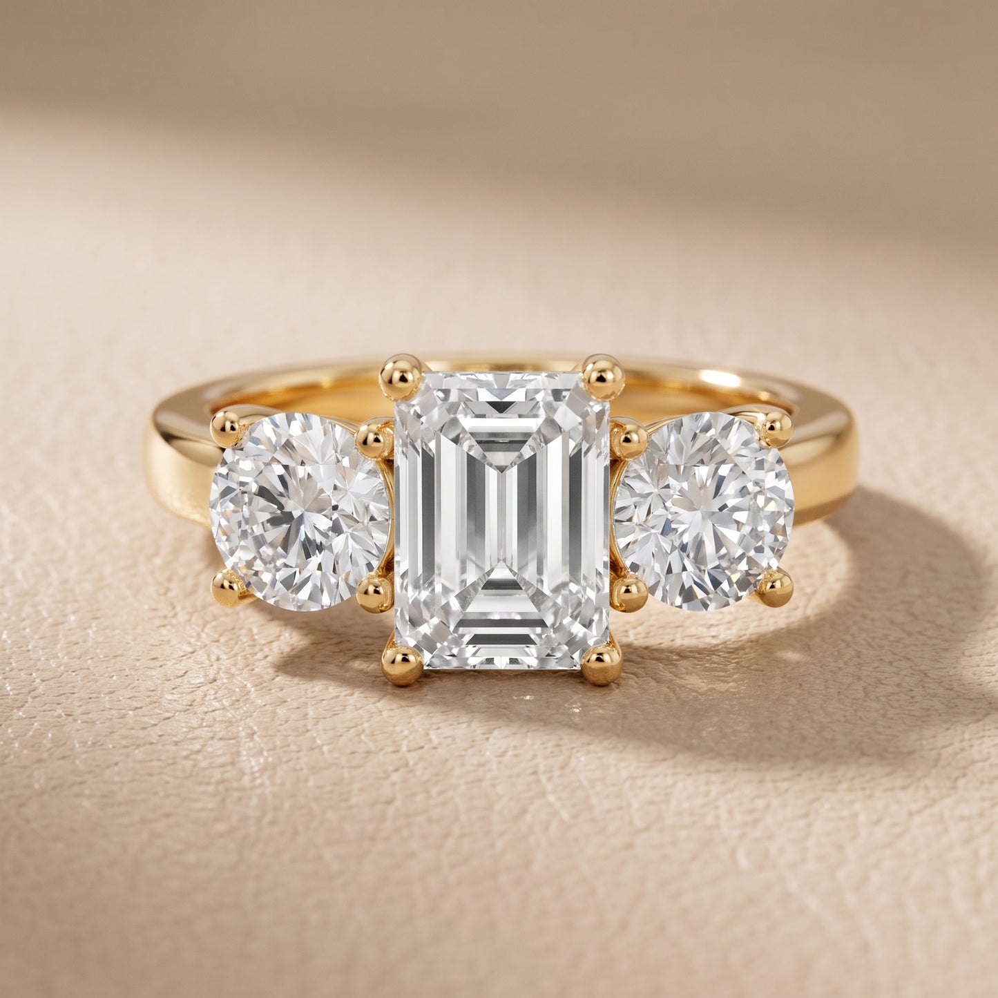 Callie Three-Stone Trellis Emerald Diamond Ring in Yellow Gold - front.jpg