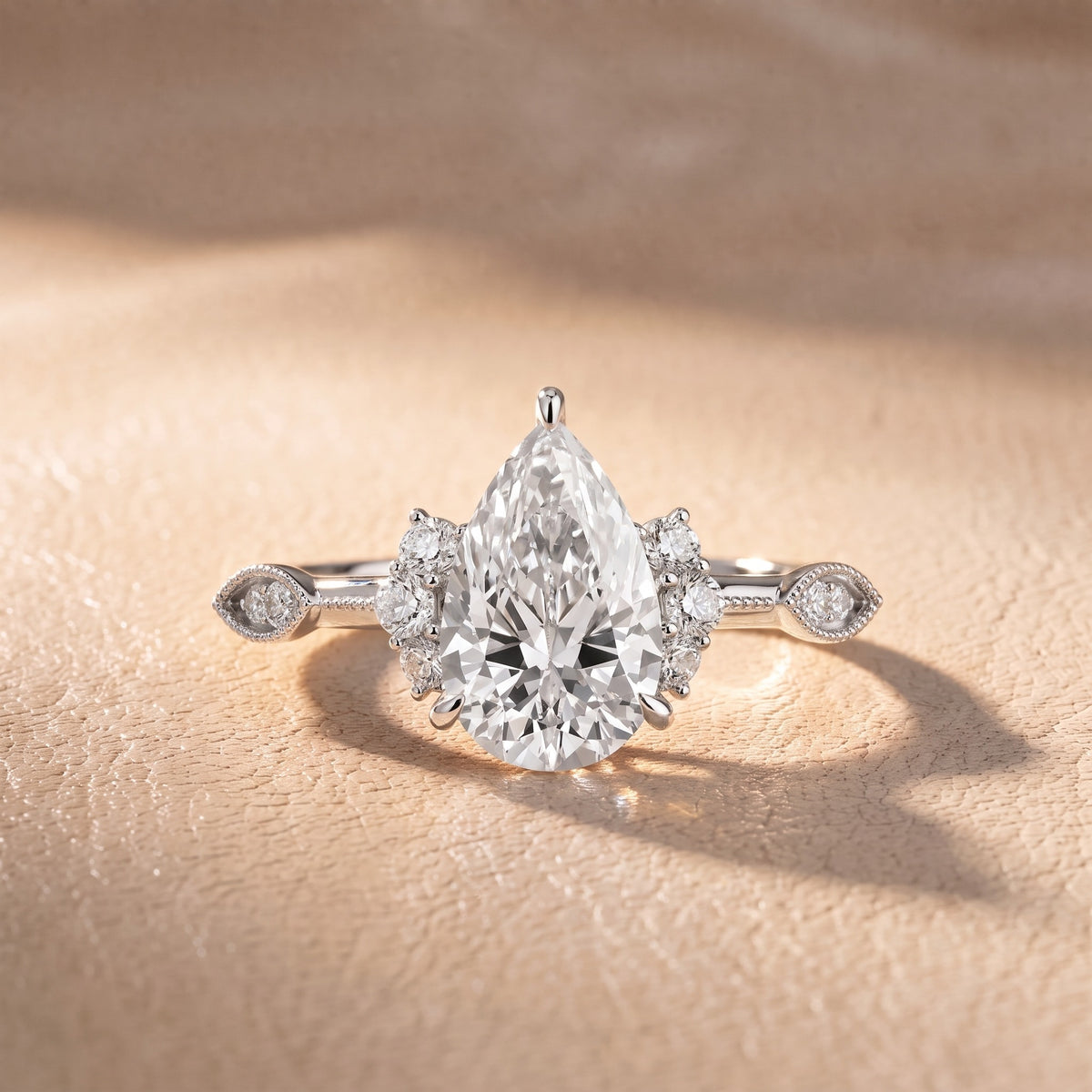 Naomi Vintage Milgrain Pear Diamond Engagement Ring in Silver - front.jpg
