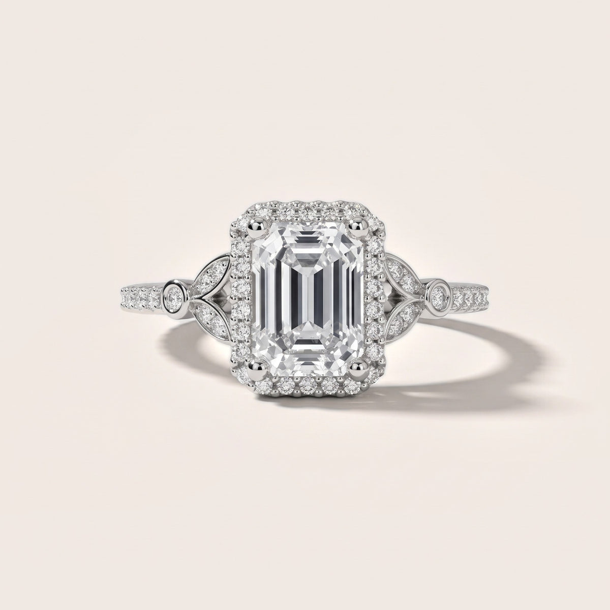 Sitka Leaf Halo Emerald Diamond Engagement Ring in White Gold - front.jpg