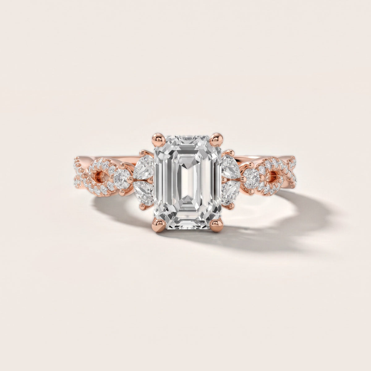 Neva Infinity Twist Emerald Diamond Engagement Ring in Rose Gold - front.jpg