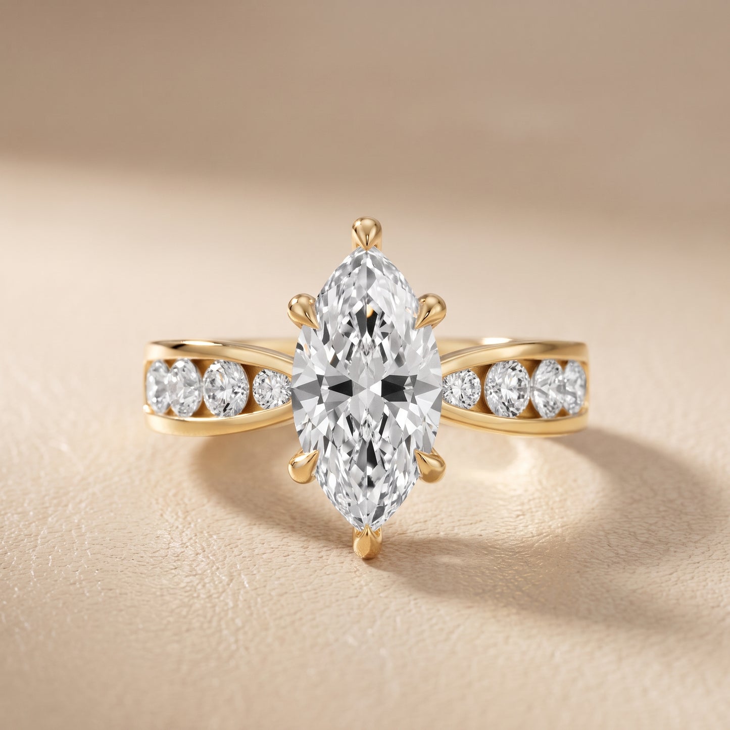 Noor Channel Set Sidestone Marquise Diamond Engagement Ring in Yellow Gold - front.jpg