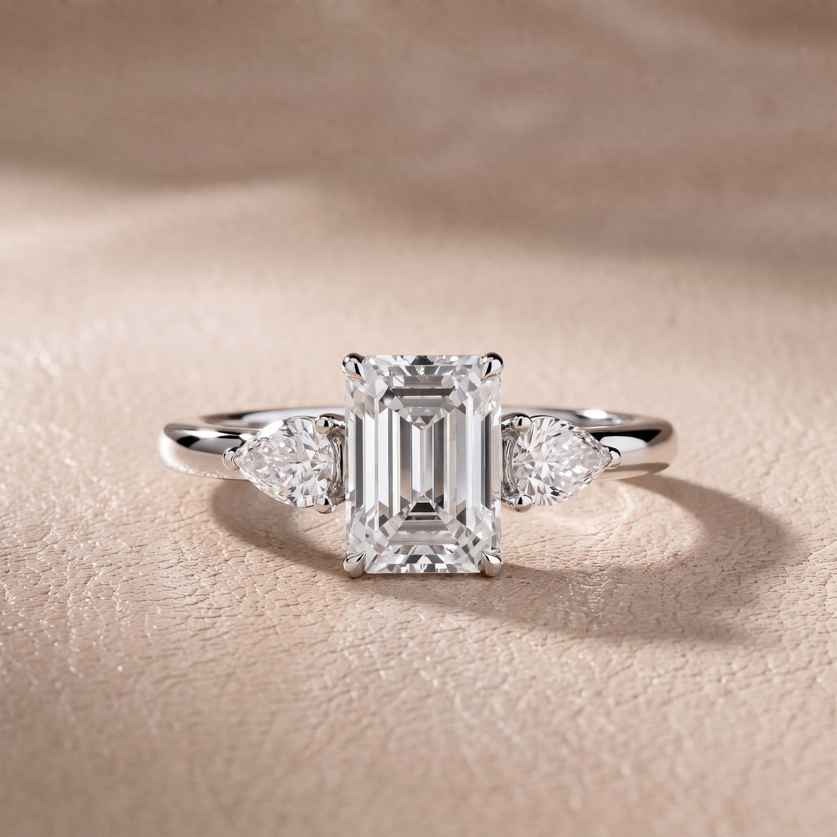 Stella Three-Stone Emerald Diamond Engagement Ring in Silver - front.jpg