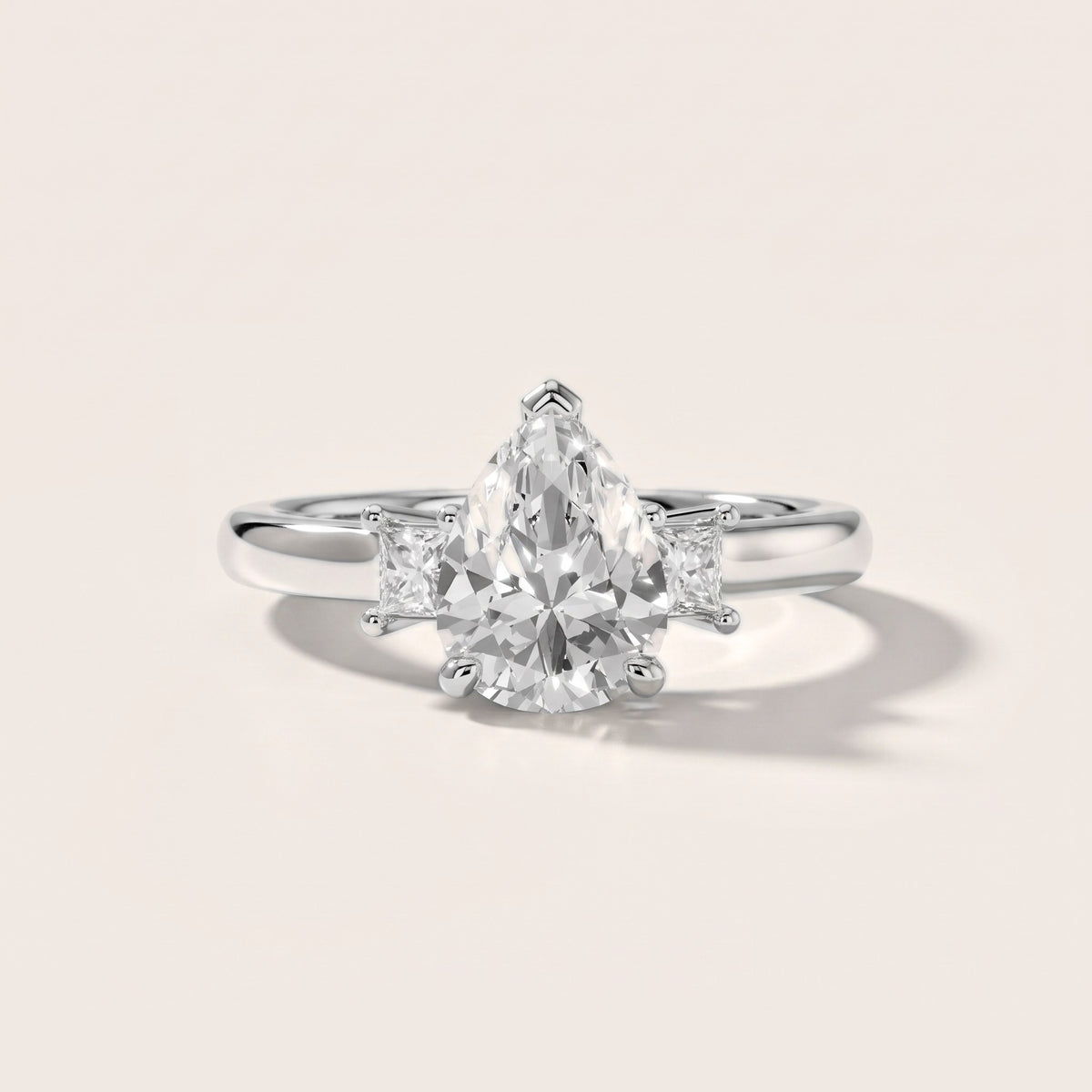Brenna Three-Stone Pear Diamond Engagement Ring in Silver - front.jpg