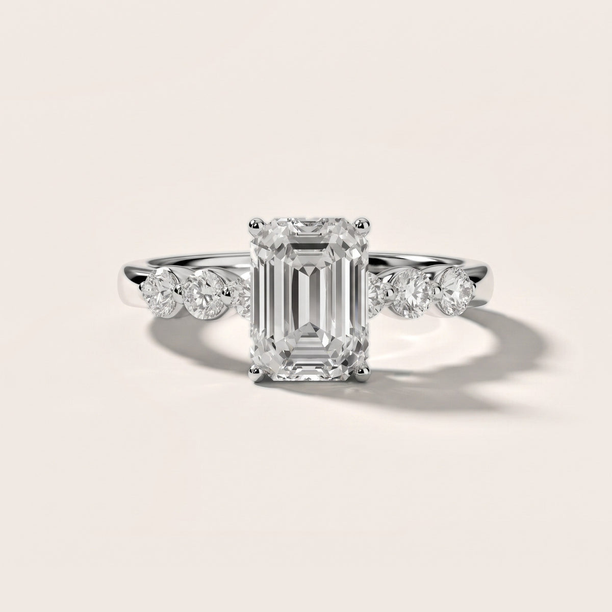 Vienna Floating Five-Stone Emerald Diamond Engagement Ring in Silver - front.jpg