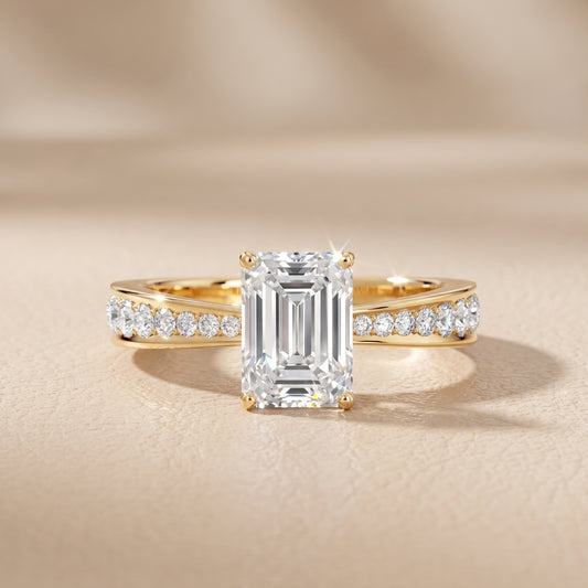 Rhea Sidestone Pavé Emerald Diamond Engagement Ring in Yellow Gold - front.jpg