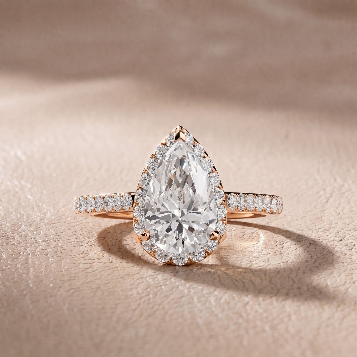 Alma Halo Pavé Pear Diamond Engagement Ring in Rose Gold - front.jpg