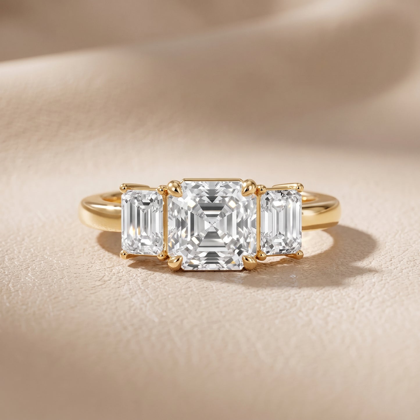 Zoe Three-Stone Asscher Diamond Ring in Yellow Gold - front.jpg