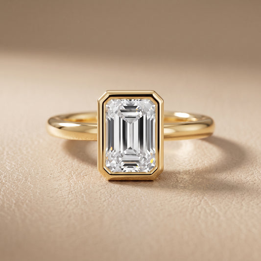 Maeve Bezel Solitaire Emerald Diamond Ring in Yellow Gold - front.jpg