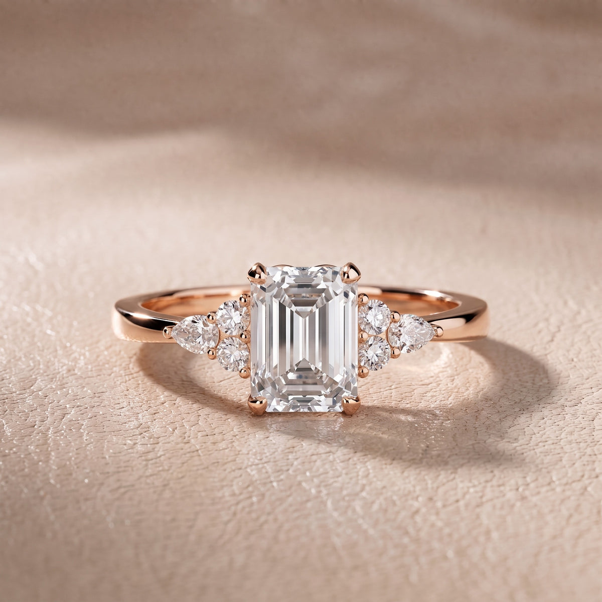 Amelia Three Stone Emerald Diamond Engagement Ring in Rose Gold - front.jpg