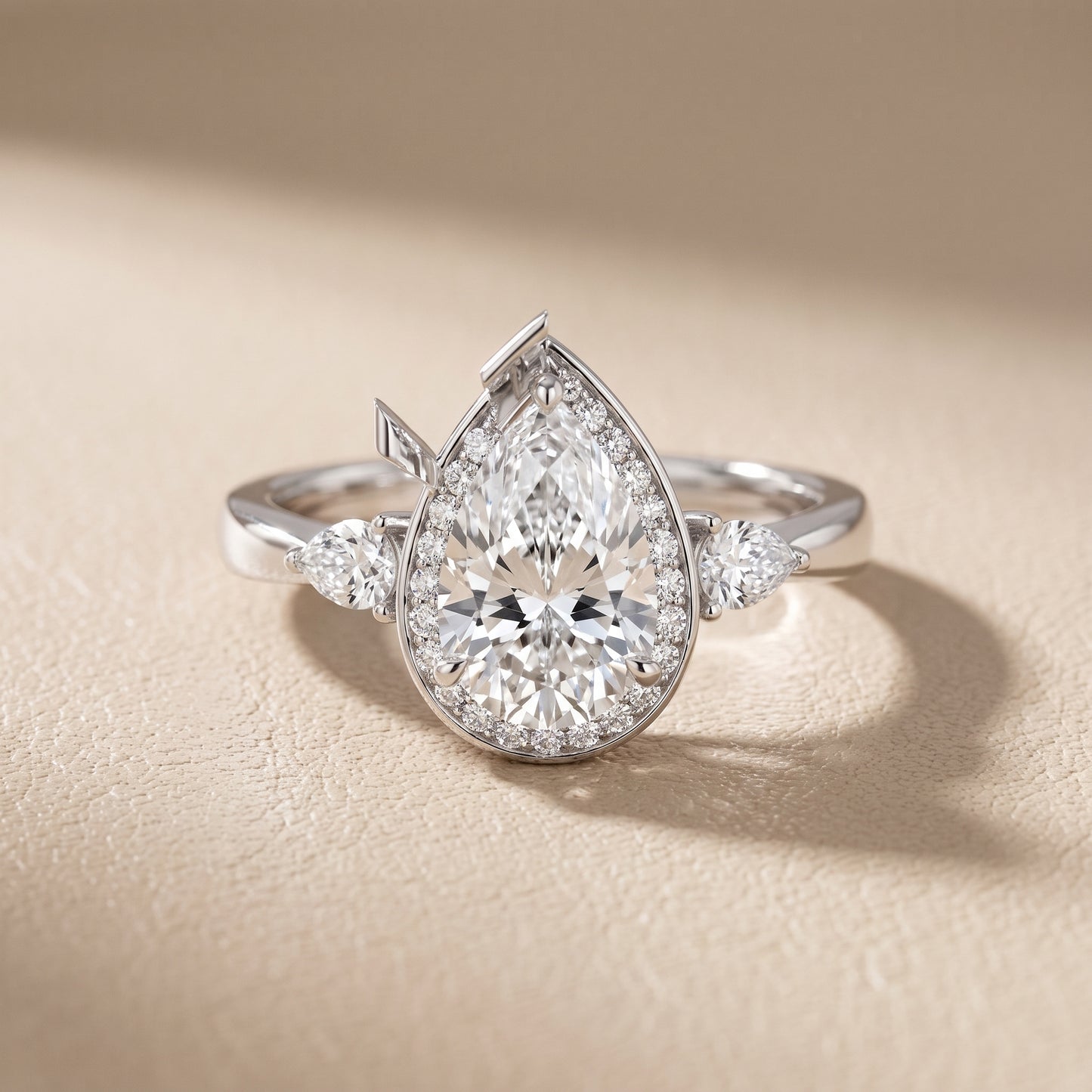 Eliza Halo Sidestone Pear Diamond Engagement Ring in Platinum - front.jpg