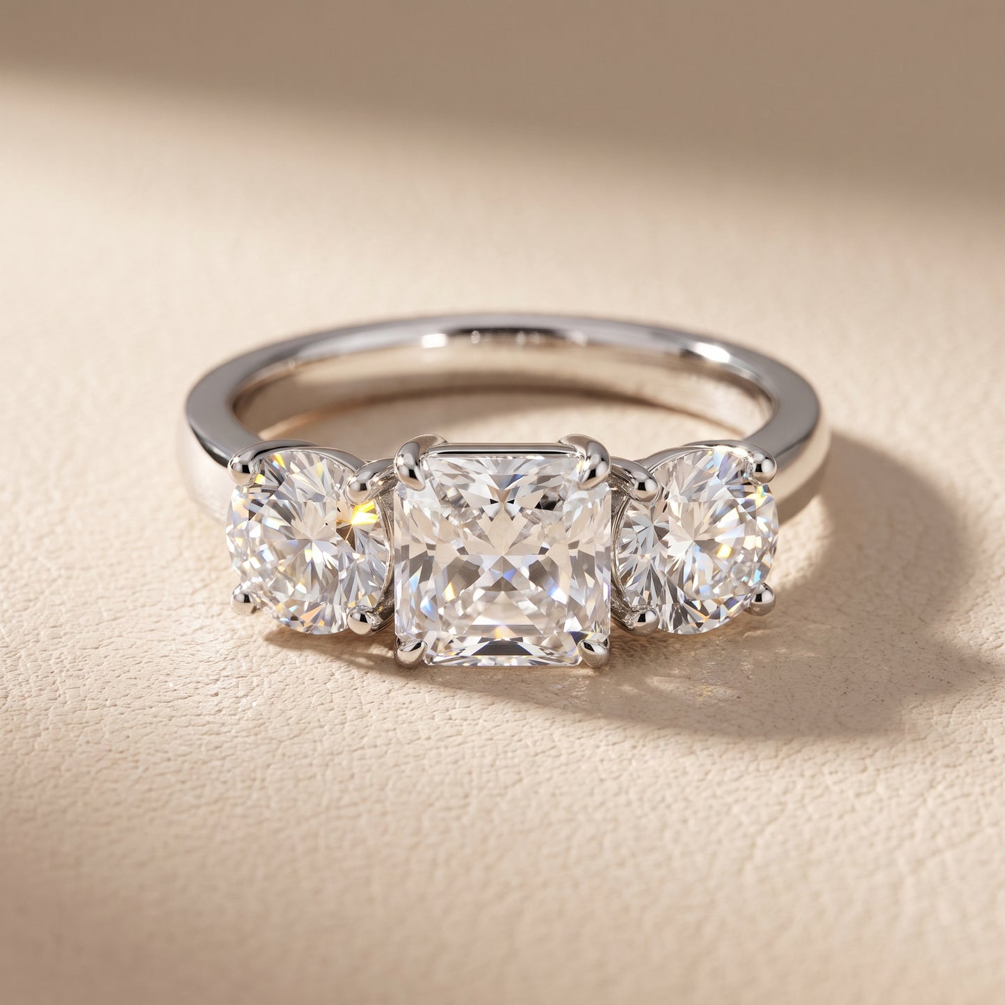 Esme Three-Stone Tapered Radiant Diamond Ring in Platinum - front.jpg