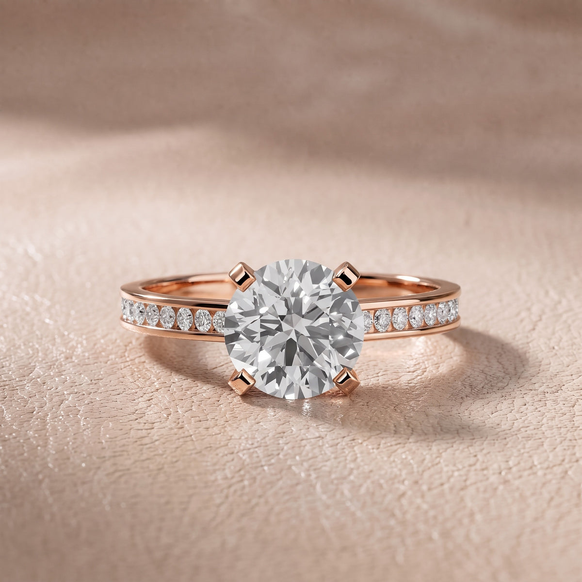 Tessa Solitaire Channel Set Round Diamond Engagement Ring in Rose Gold - front.jpg
