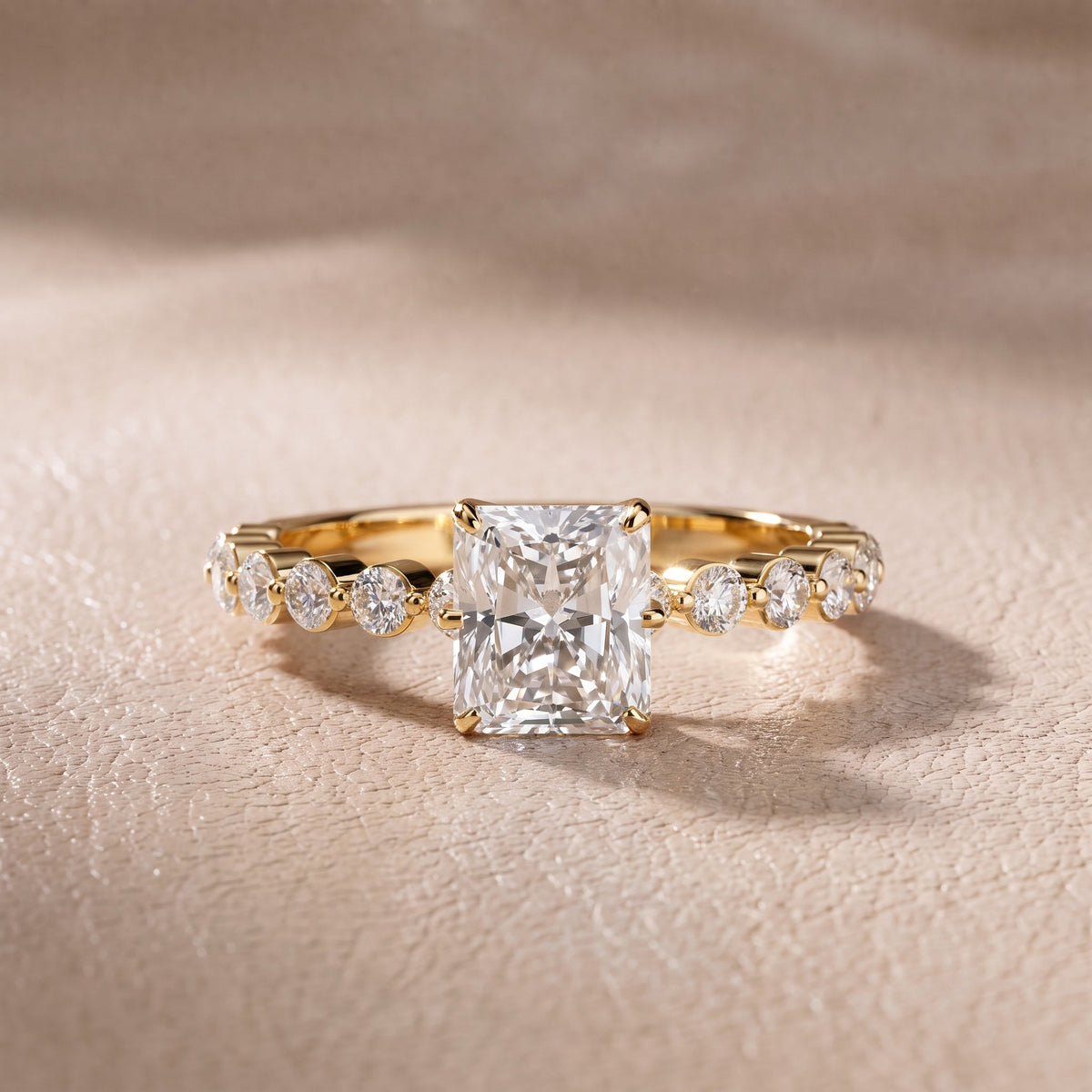 Eleanor Majesty Side Stone Radiant Diamond Engagement Ring in Yellow Gold - front.jpg
