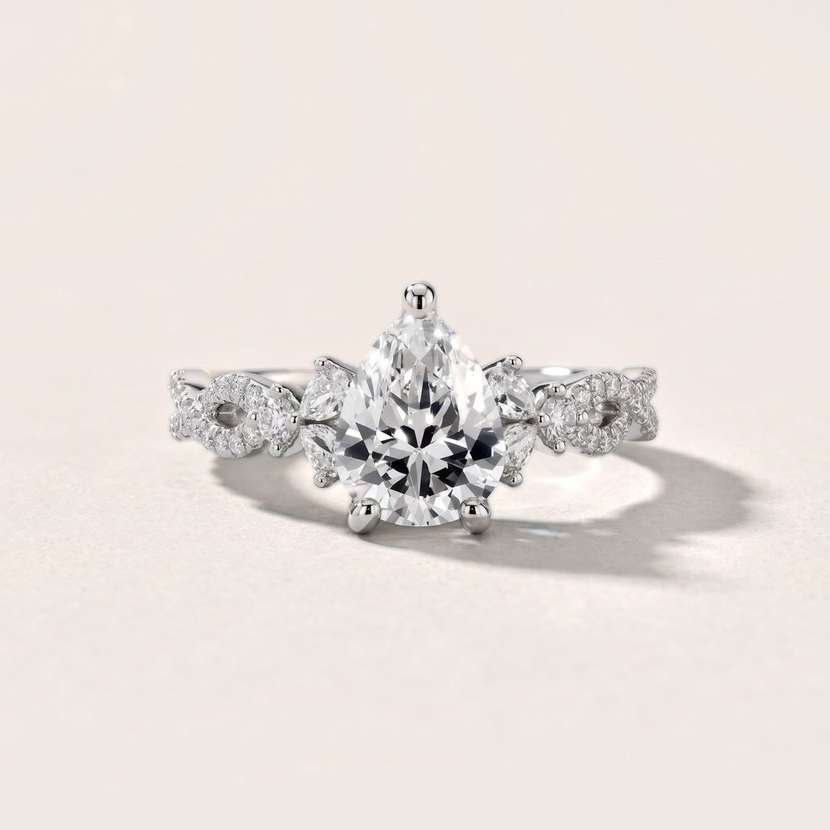 Neva Infinity Twist Pear Diamond Engagement Ring in Silver - front.jpg