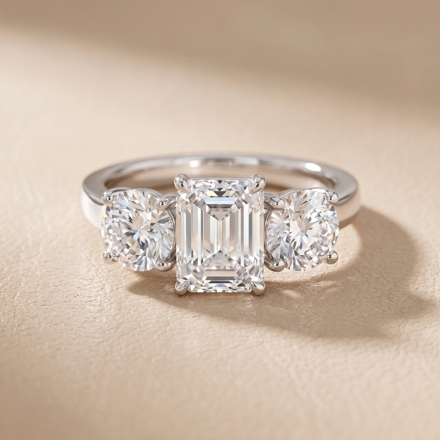 Esme Three-Stone Tapered Emerald Diamond Ring in White Gold - front.jpg