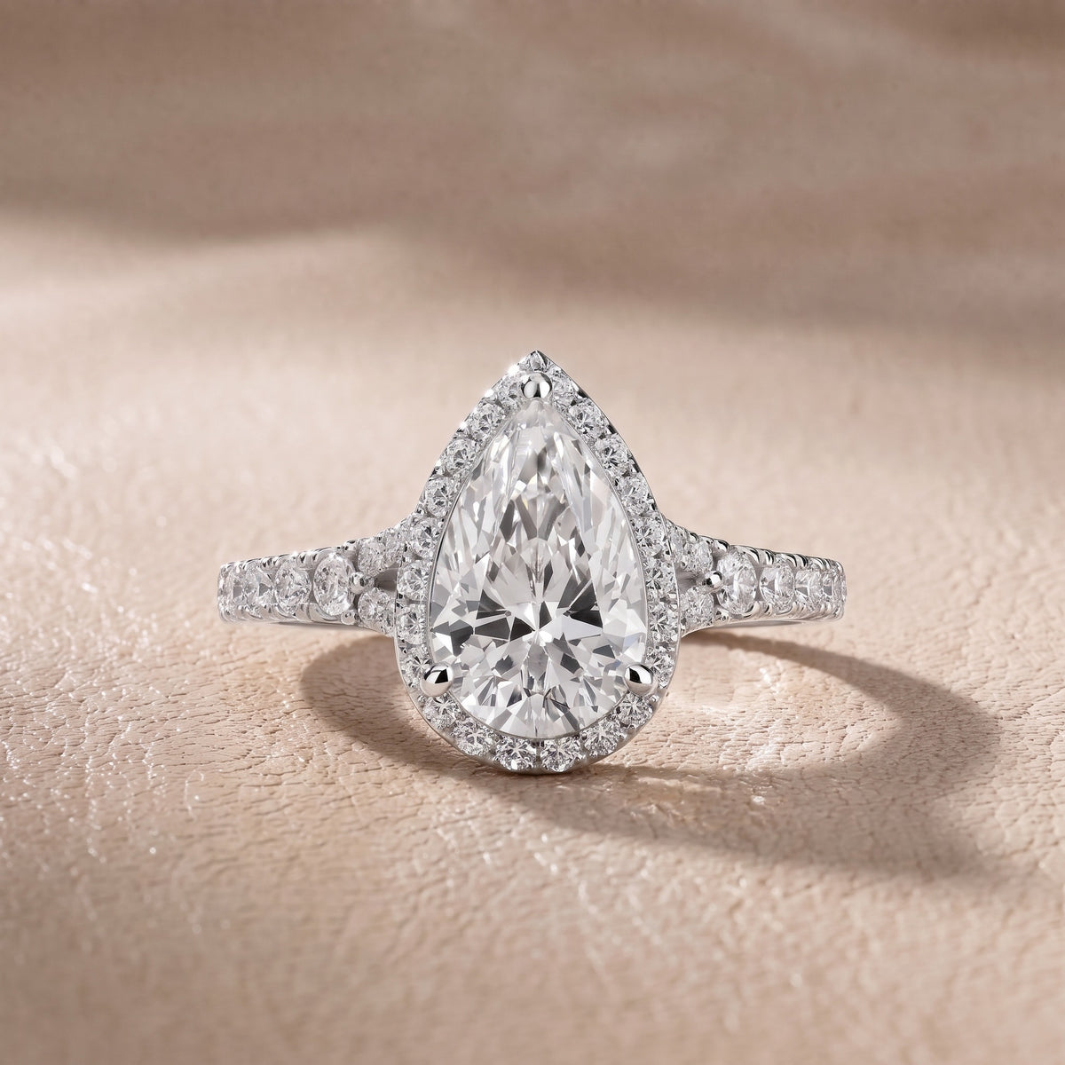 Bella Halo Pavé Pear Diamond Engagement Ring in Platinum - front.jpg