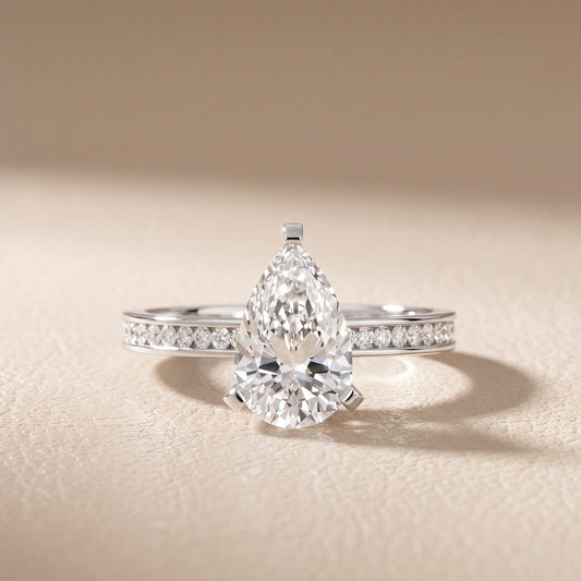Tessa Solitaire Channel Set Pear Diamond Engagement Ring in White Gold - front.jpg
