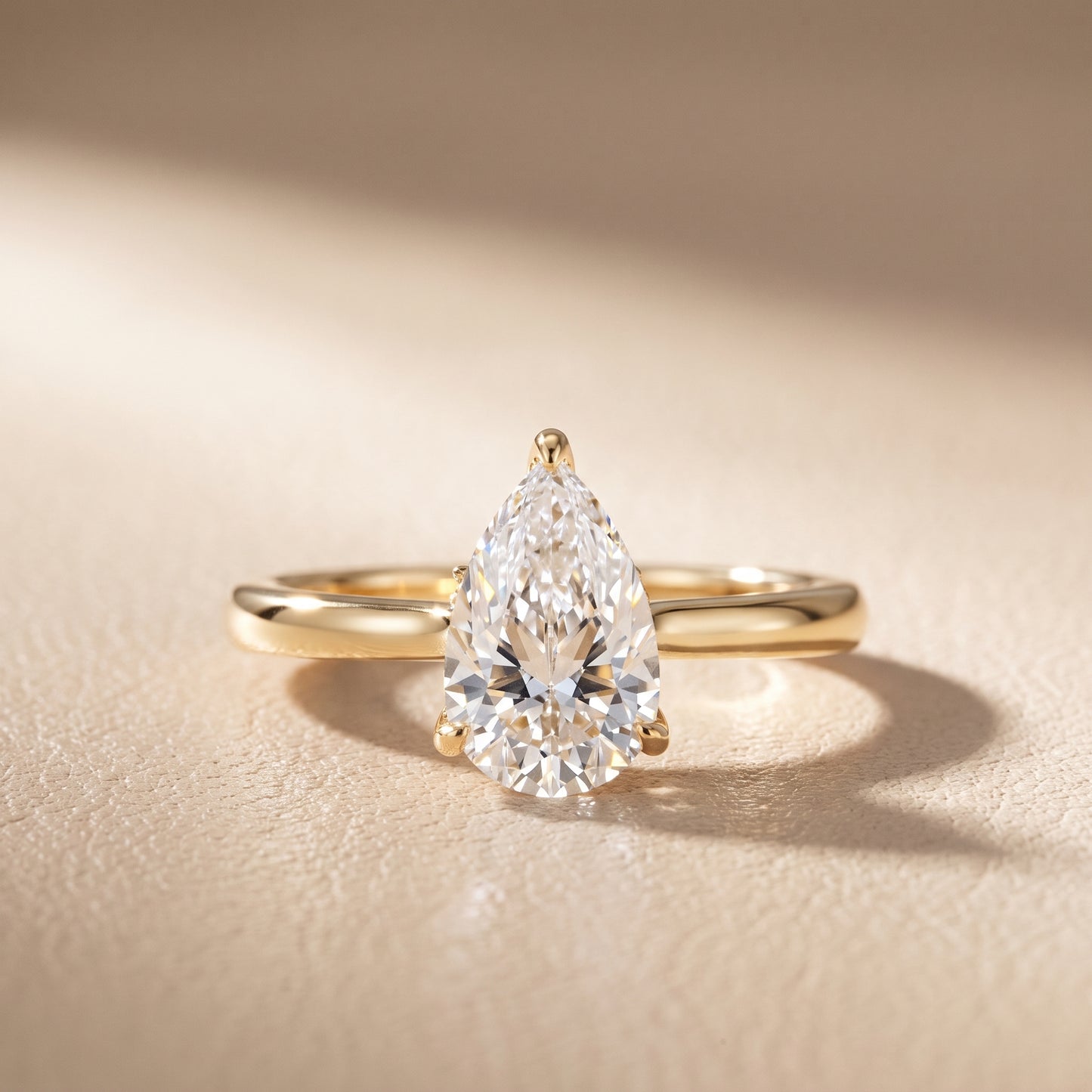 Mena Hidden Halo Pear Diamond Engagement Ring in Yellow Gold - front.jpg