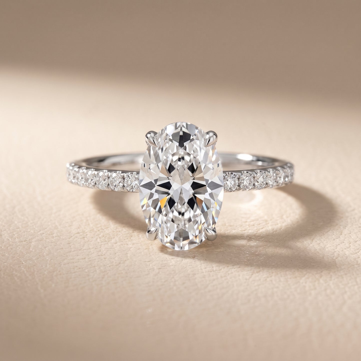 Ione Solitaire Pavé Oval Diamond Engagement Ring in Silver - front.jpg