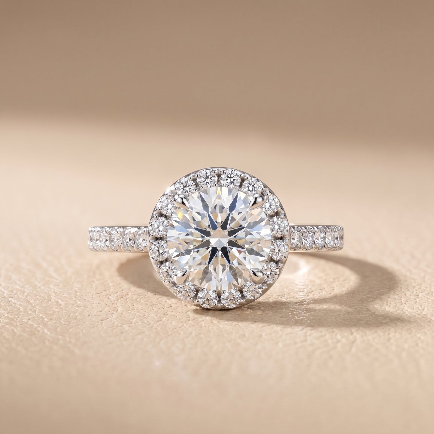 Amara Halo Claw Prong Round Diamond Ring in Platinum - front.jpg