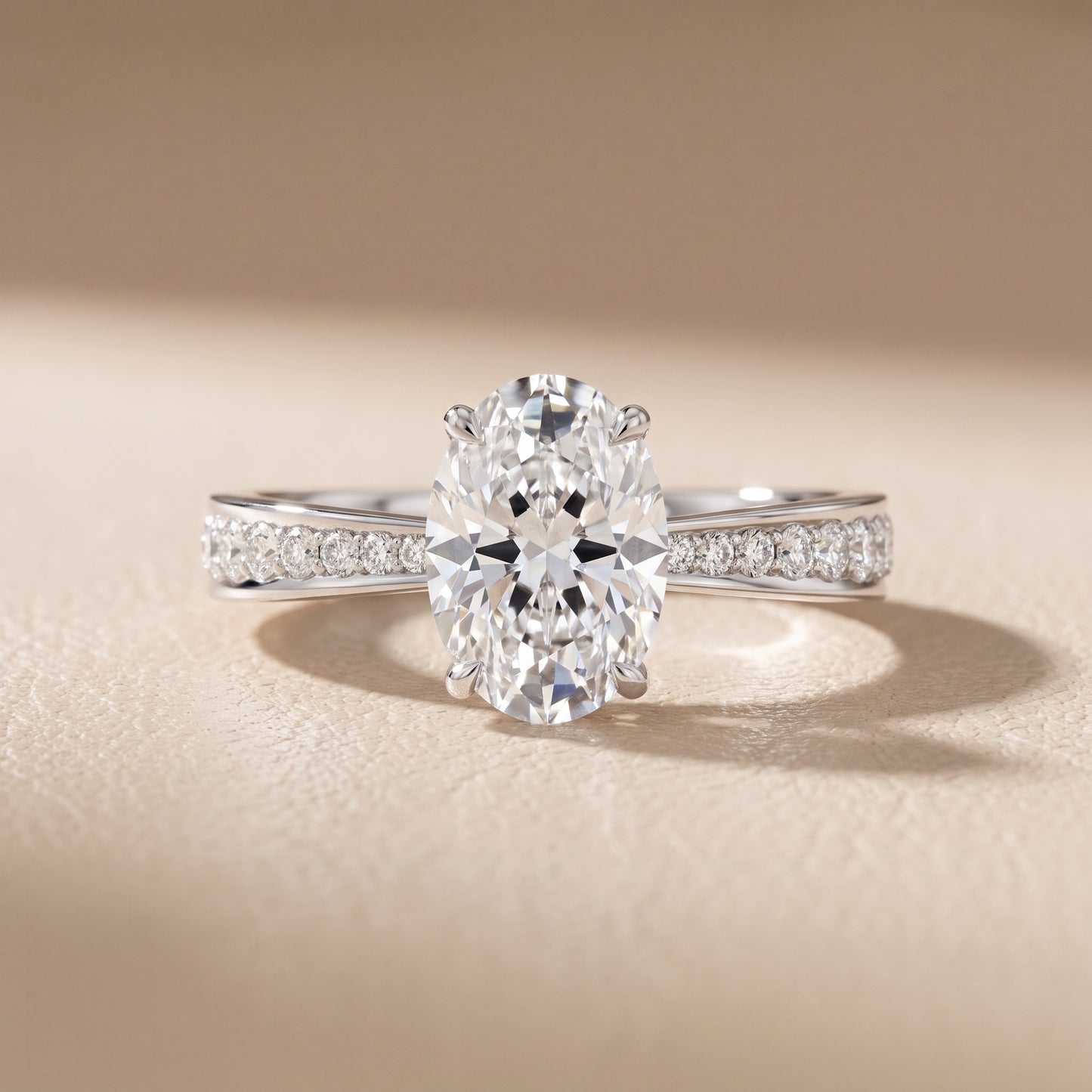 Rhea Sidestone Pavé Oval Diamond Engagement Ring in White Gold - front.jpg