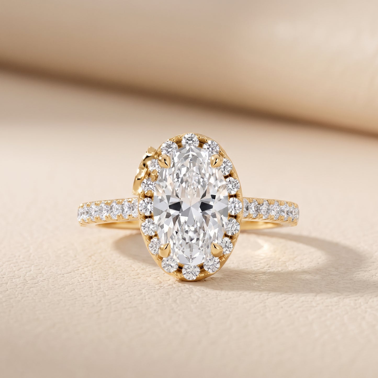 Amara Halo Claw Prong Oval Diamond Ring in Yellow Gold - front.jpg