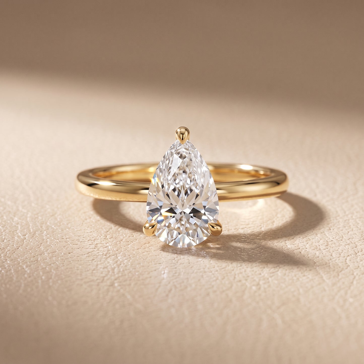 Nella Petite Solitaire Pear Diamond Engagement Ring in Yellow Gold - front.jpg