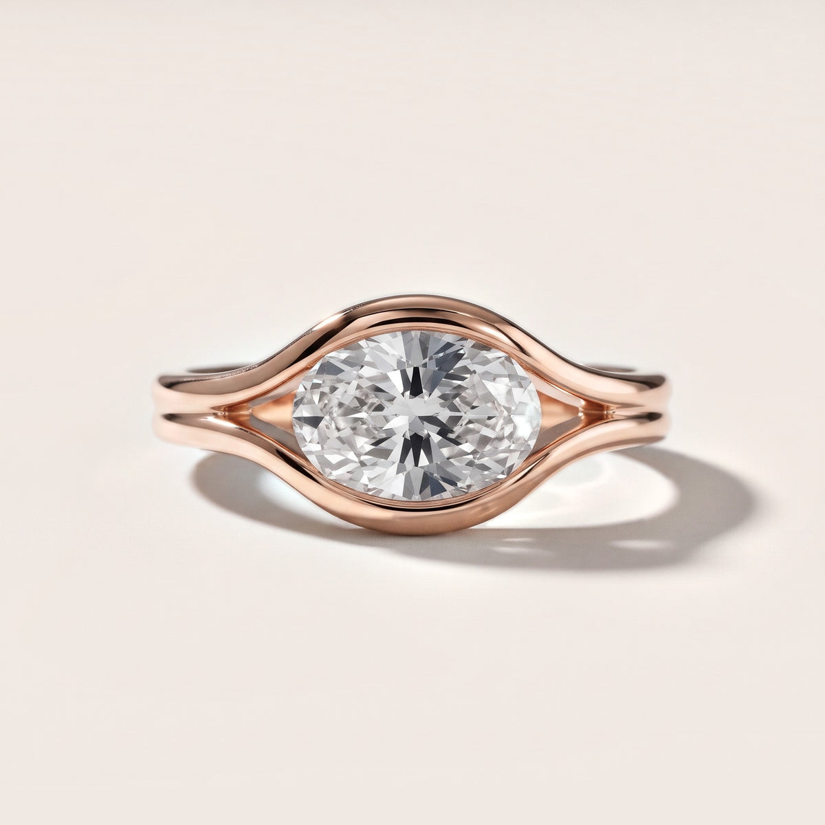 Windsor Half Bezel Solitaire Oval Diamond Engagement Ring in Rose Gold - front.jpg